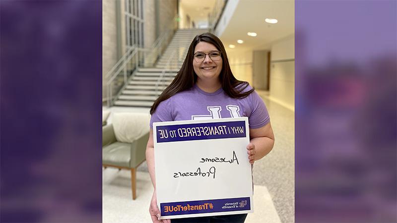 Savanah Summerfield holding sign